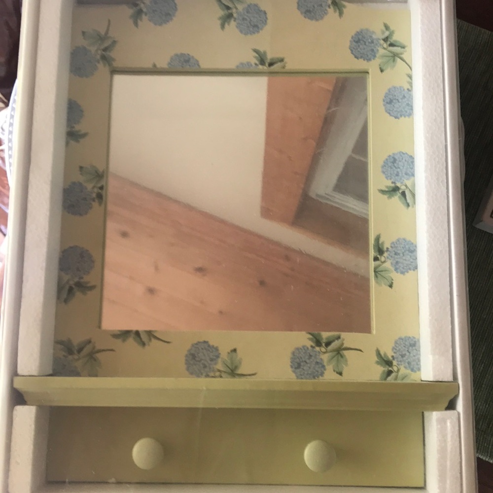 Brand new small mirror with two hooks